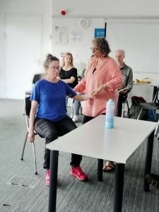 Alexander Technique practical workshop showing work with the hands in sitting