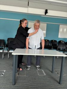 Alexander Technique practical workshop showing work with the hands in standing